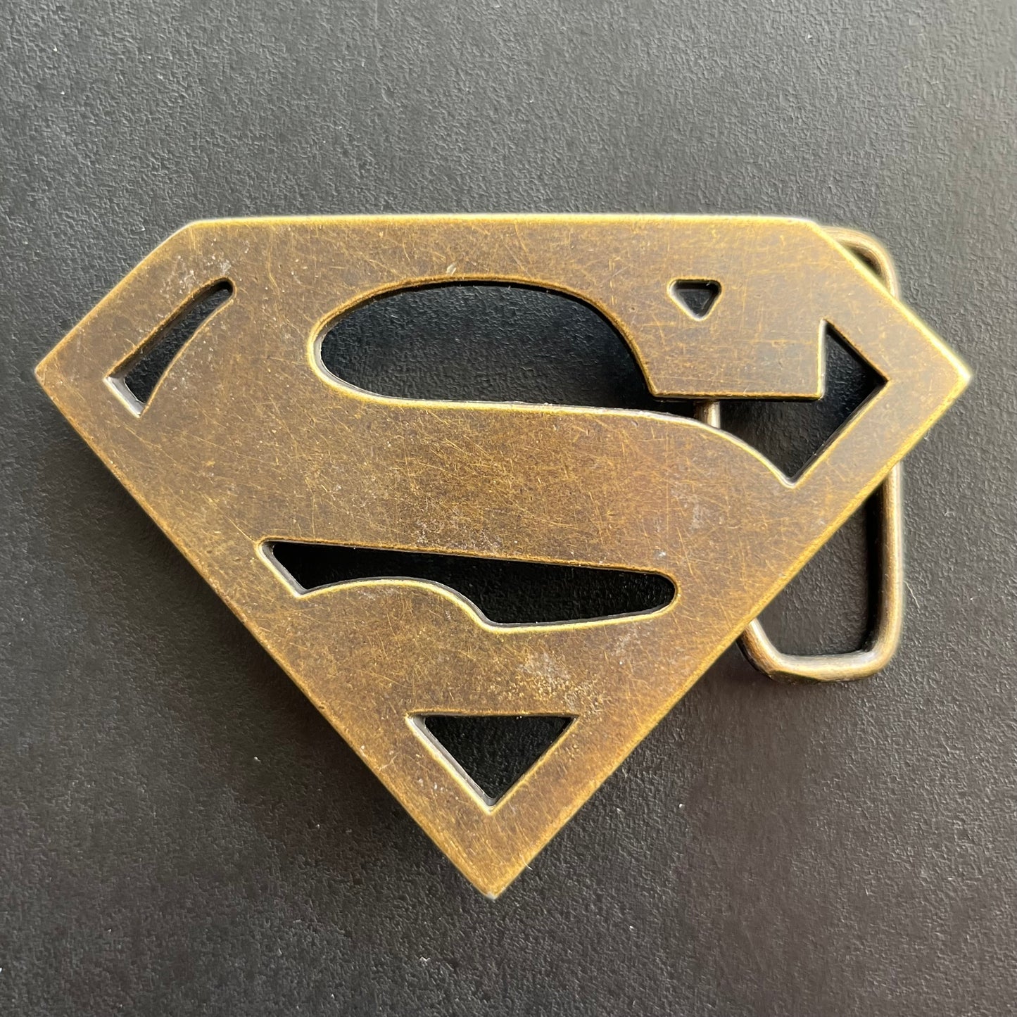 Y2K Superman belt buckle.