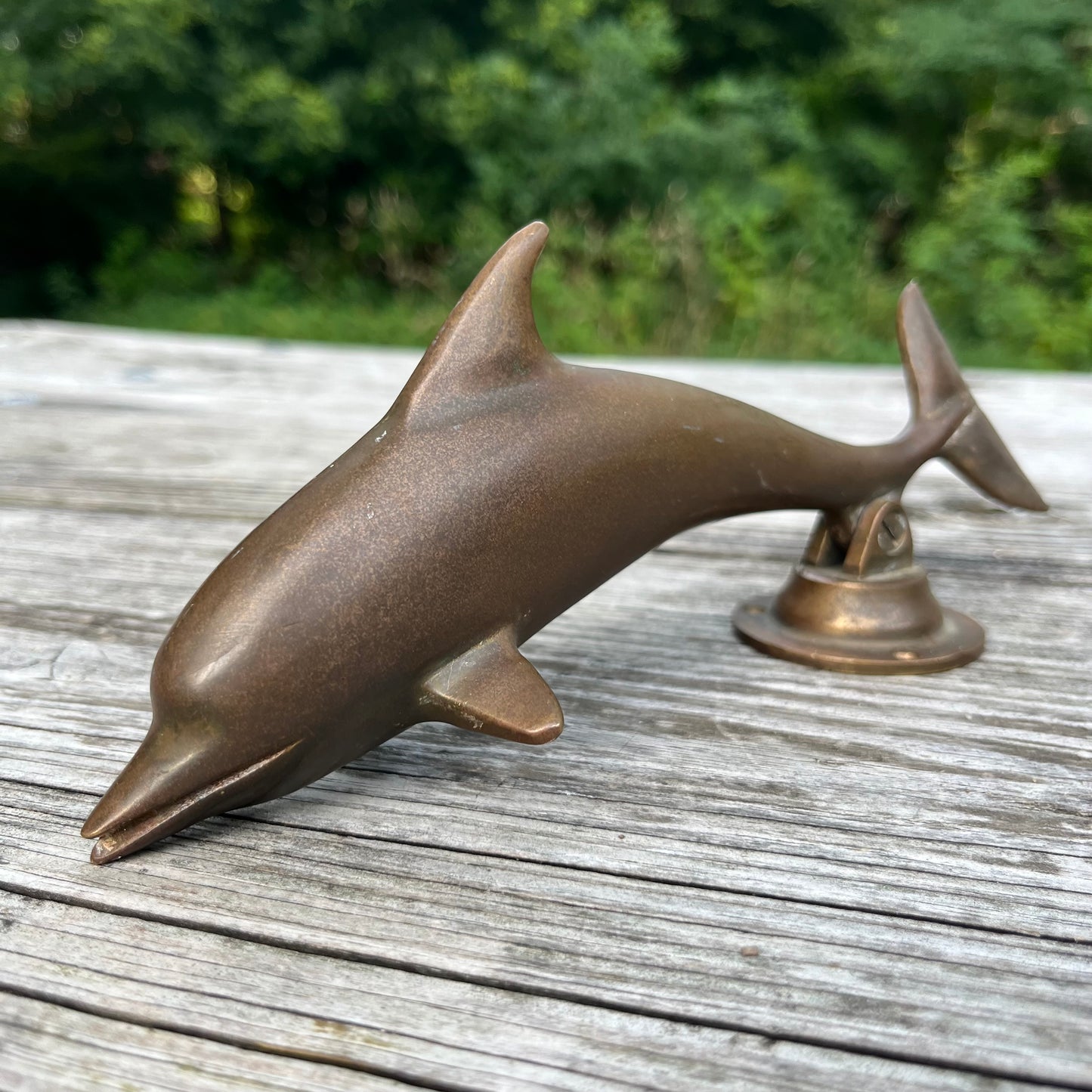 Vintage brass dolphin door knocker.