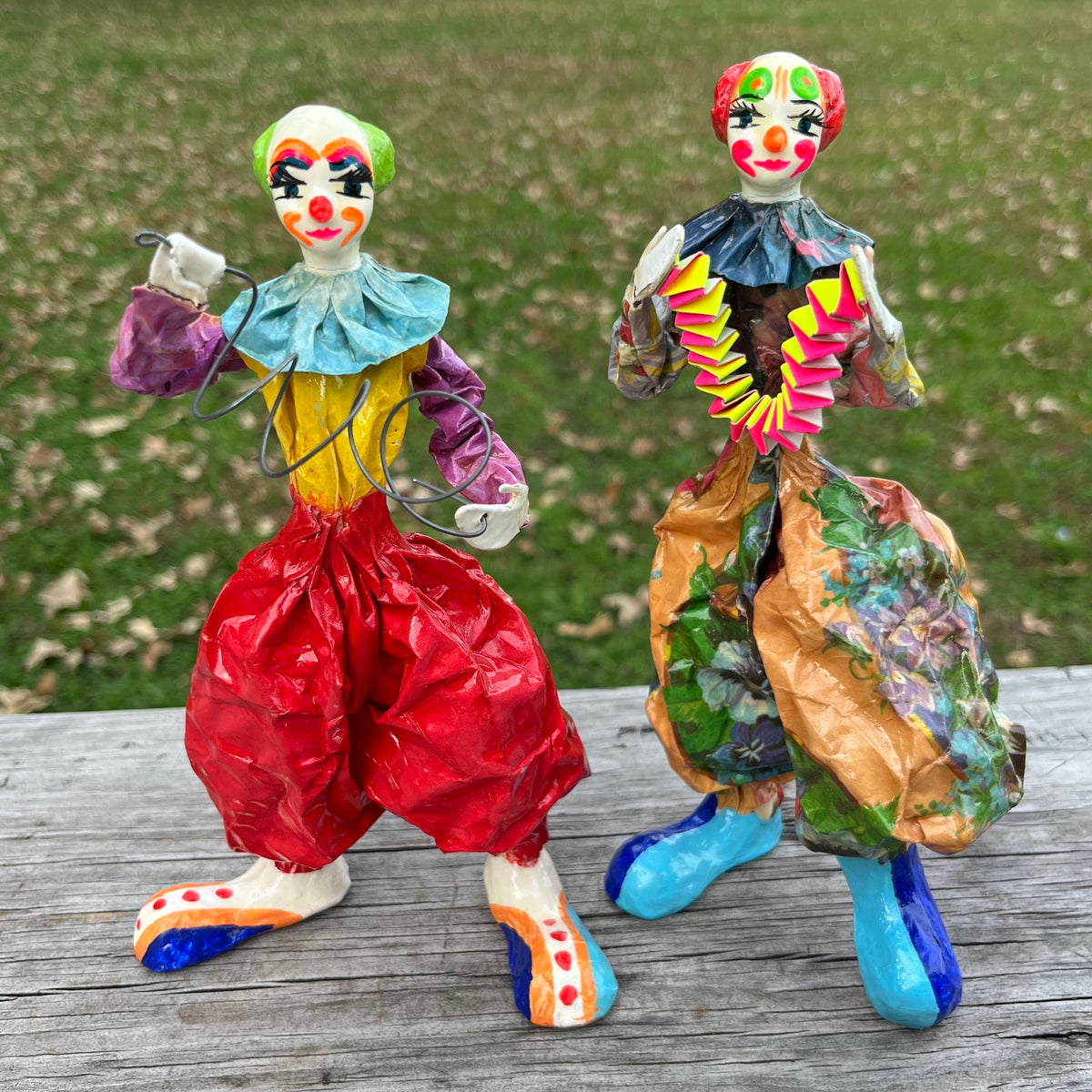 Vintage paper mache clown set.