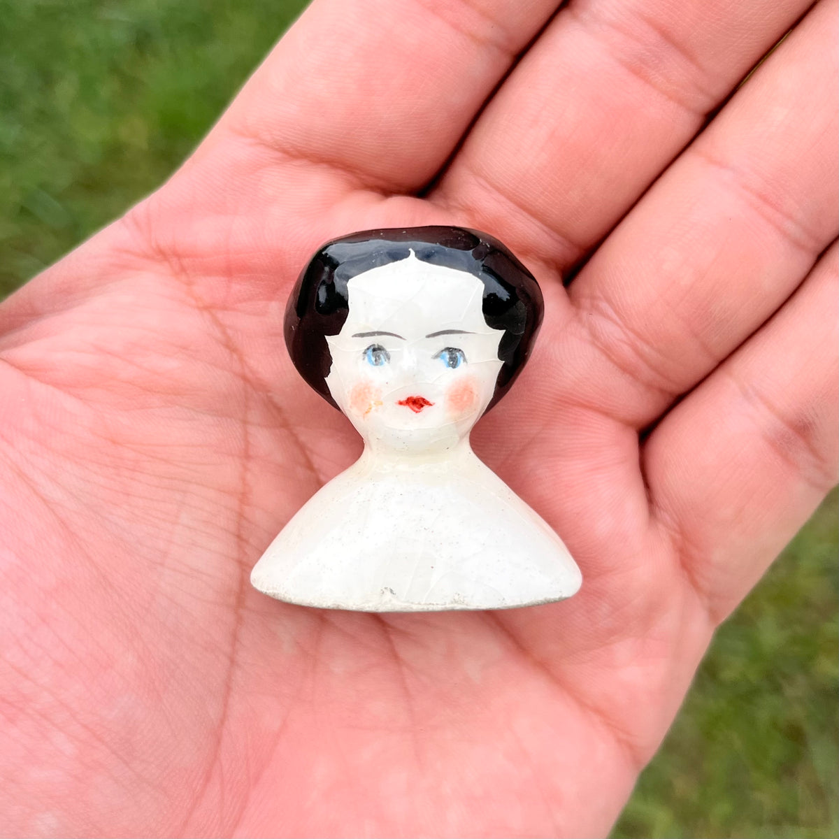 Vintage bisque doll head.
