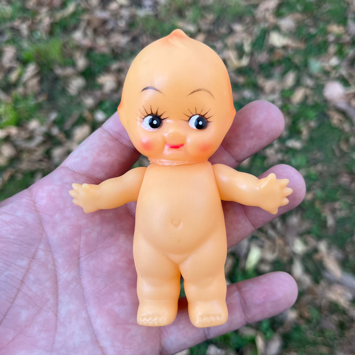 Vintage vinyl Kewpie.