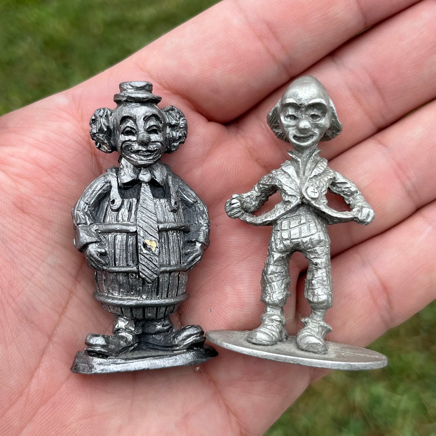 Vintage pair of pewter clowns.