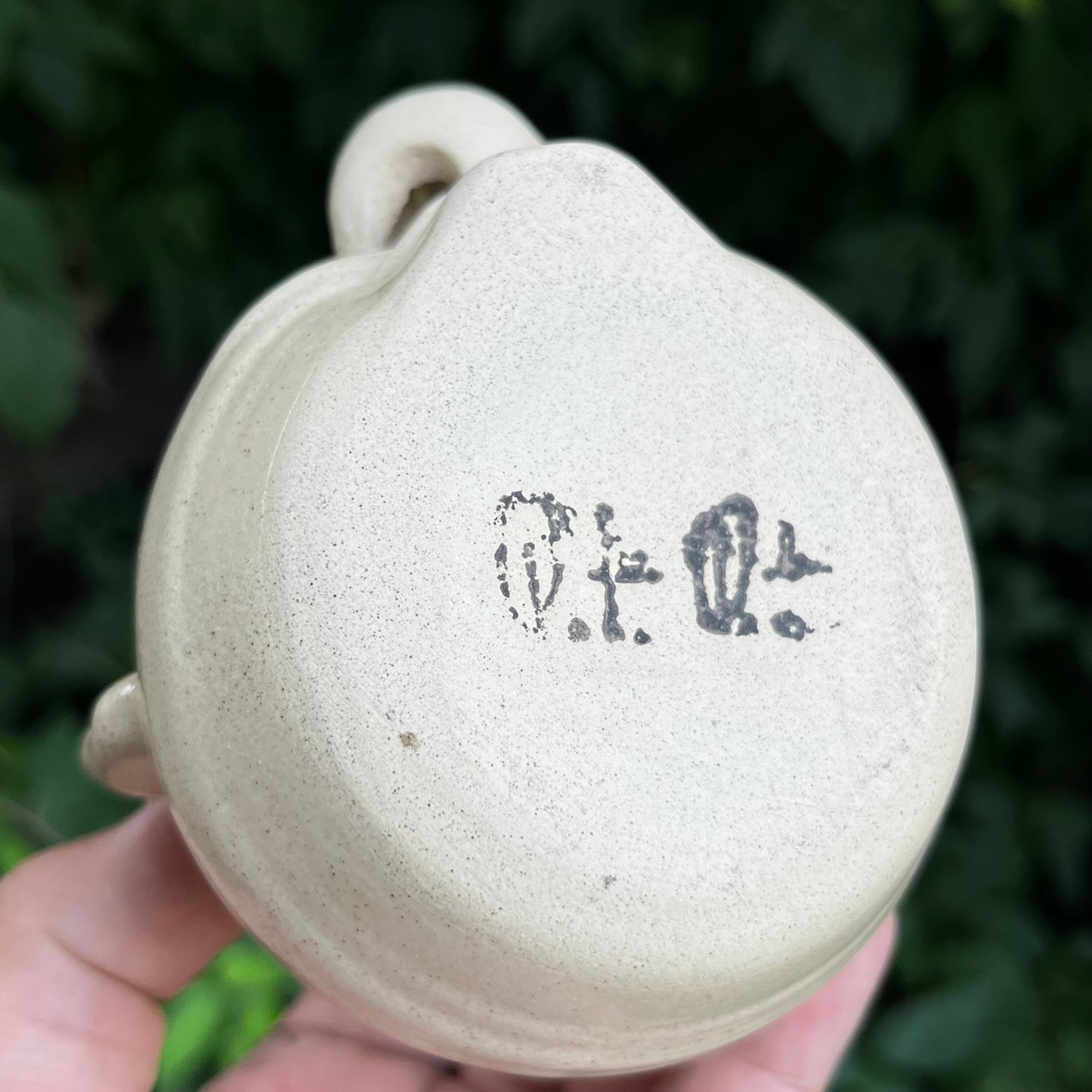 Vintage Peter Petrie stoneware egg seperator.