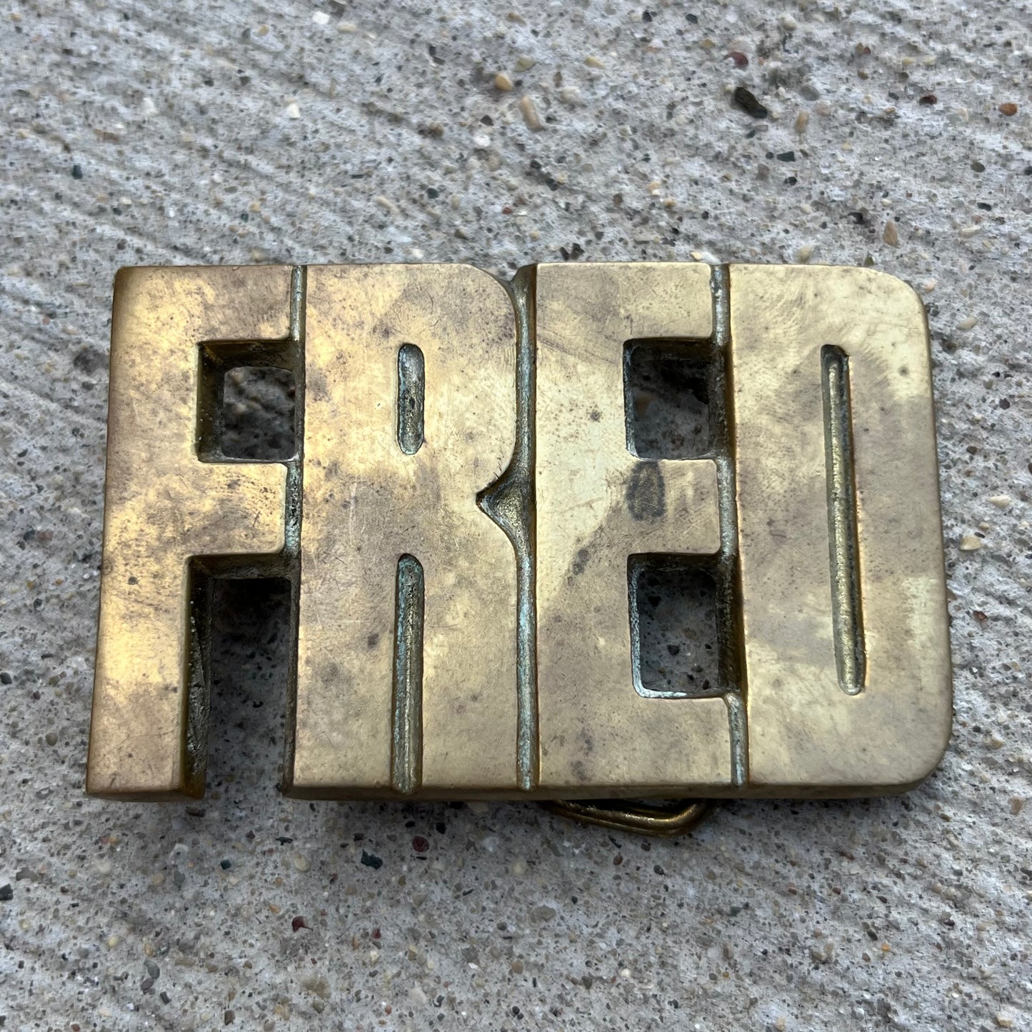 1976 Brass “Fred” belt buckle.