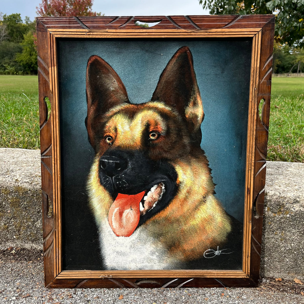 Vintage black velvet German Shepard painting.