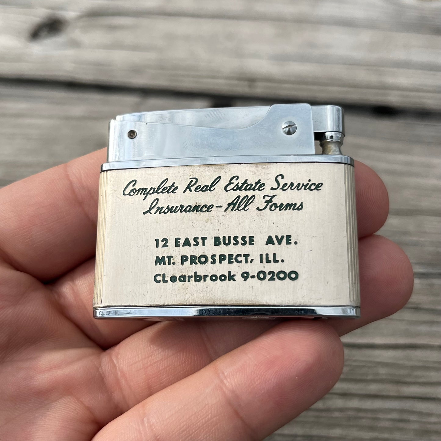 Vintage George L. Busse co. flat lighter.