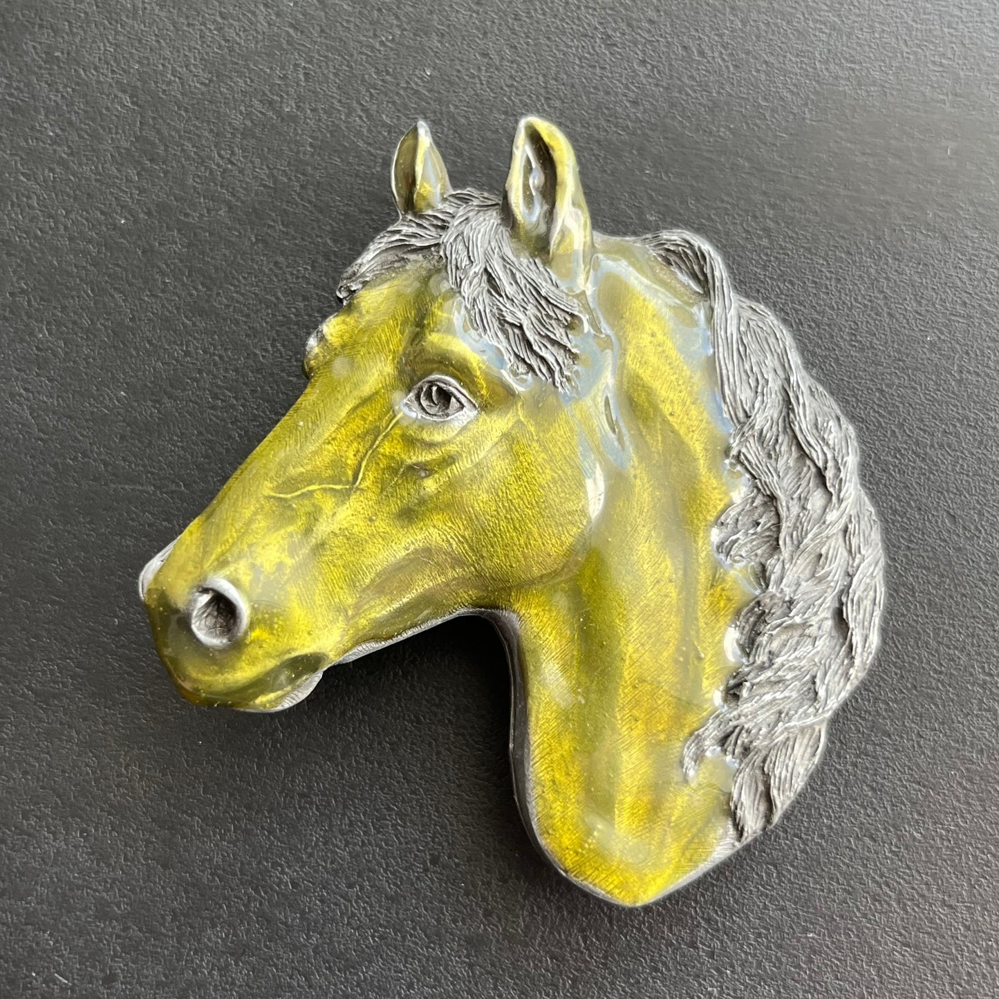1994 Horse head belt buckle.