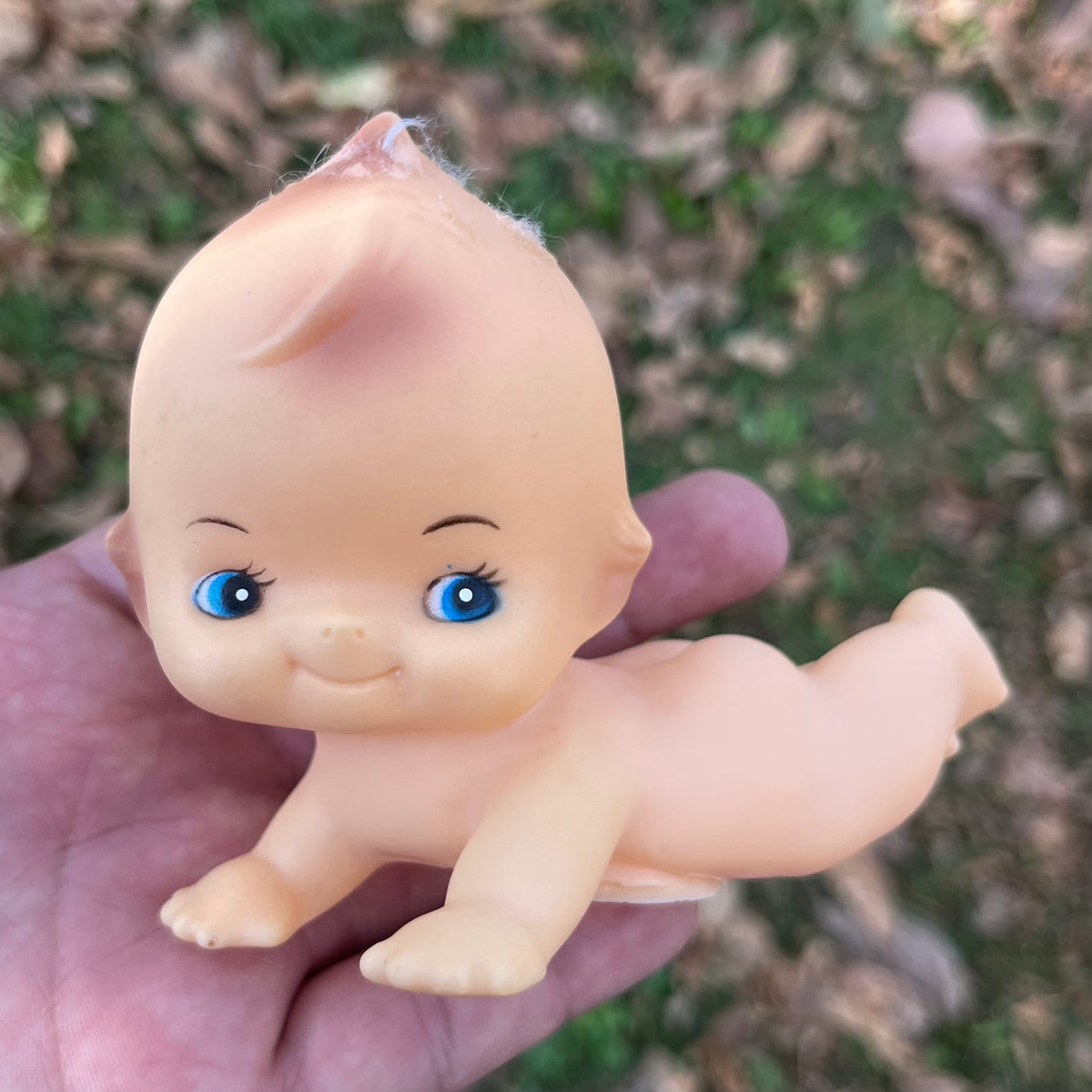 Vintage vinyl Kewpie.