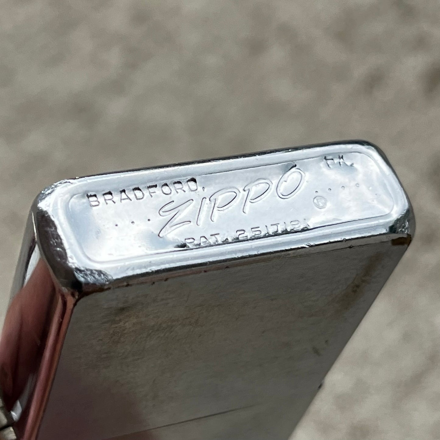 1960s Zippo flip lighter.
