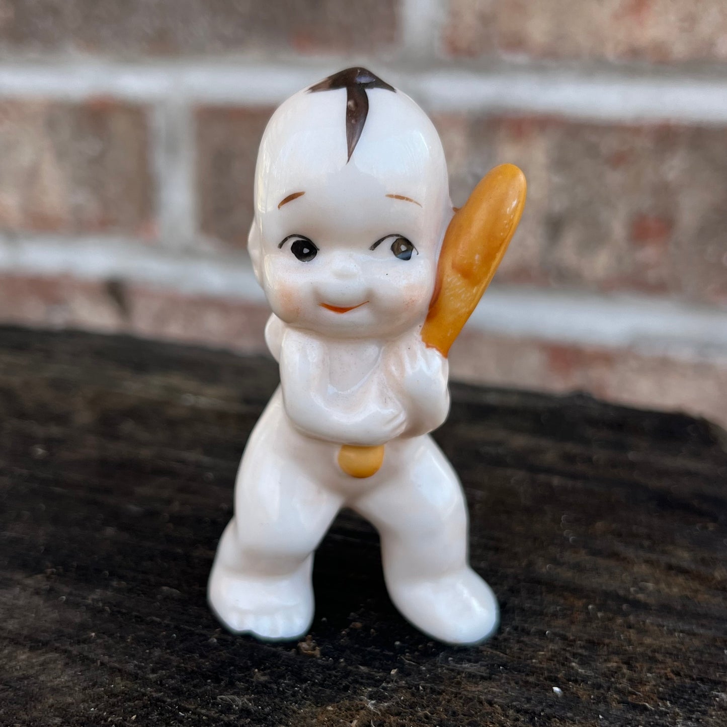 Vintage baseball Kewpie.