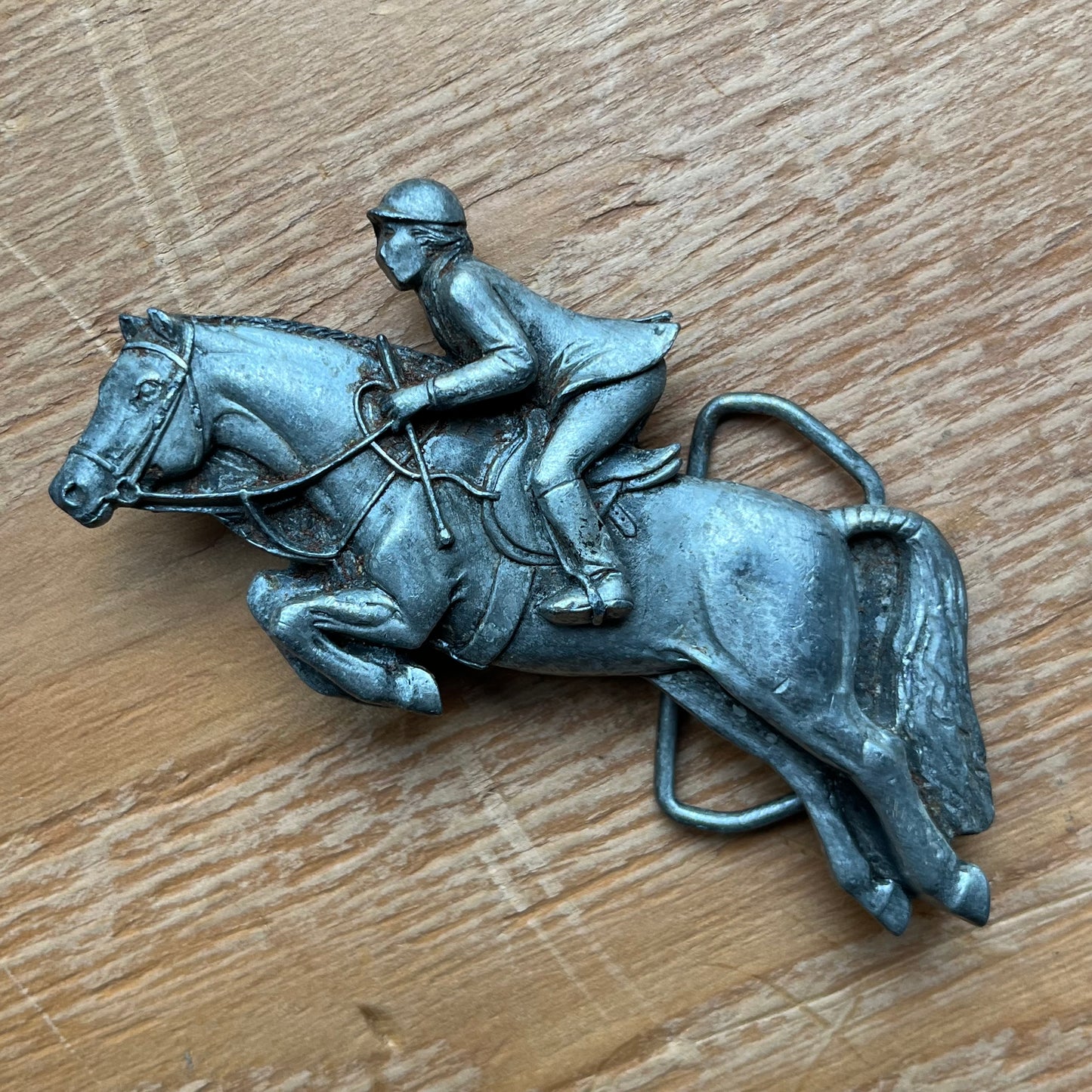1980s Horse jocket belt buckle.