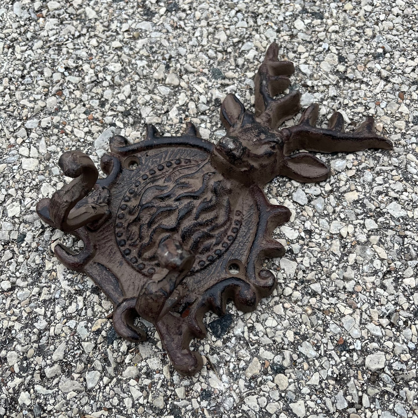 Vintage cast iron deer hooks.