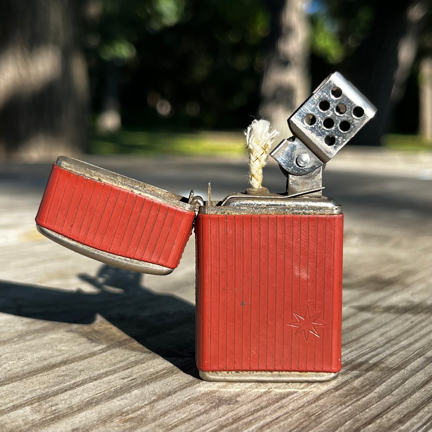 1960s Trimlite Champ flip lighter.