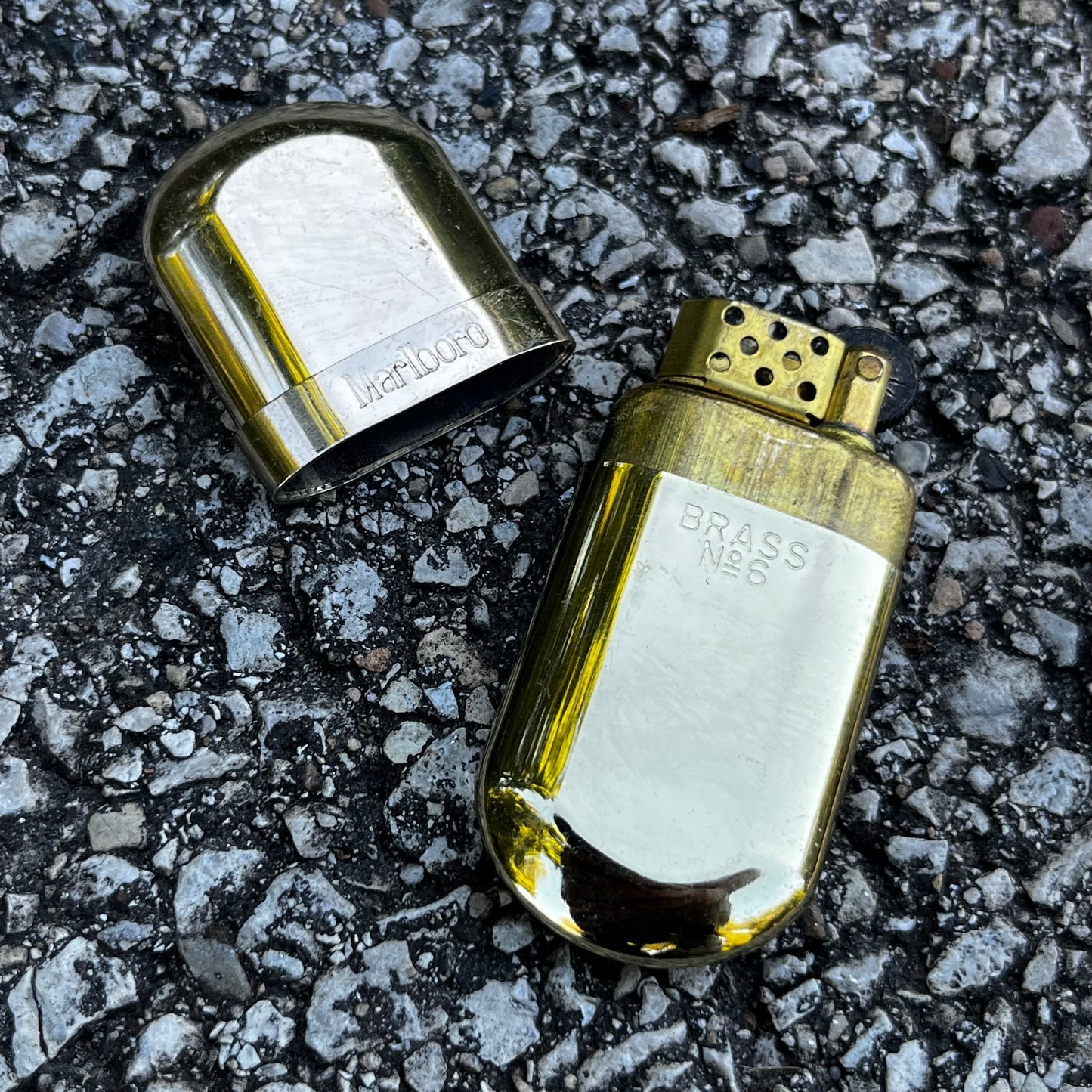 Vintage brass Marlboro pocket lighter.