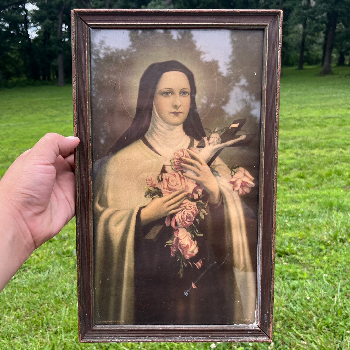1950s St. Theresa print in original frame.