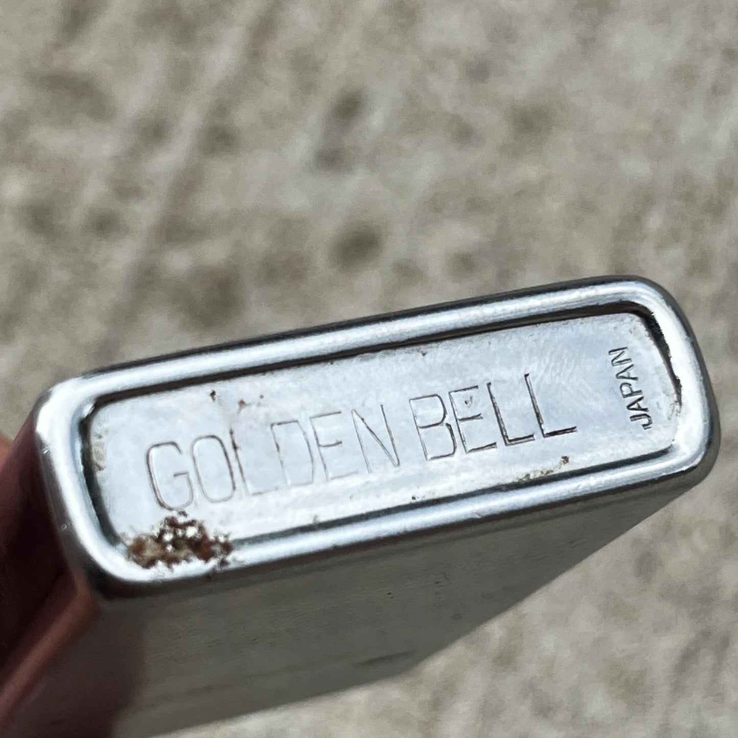 Vintage Golden Bell flip lighter.