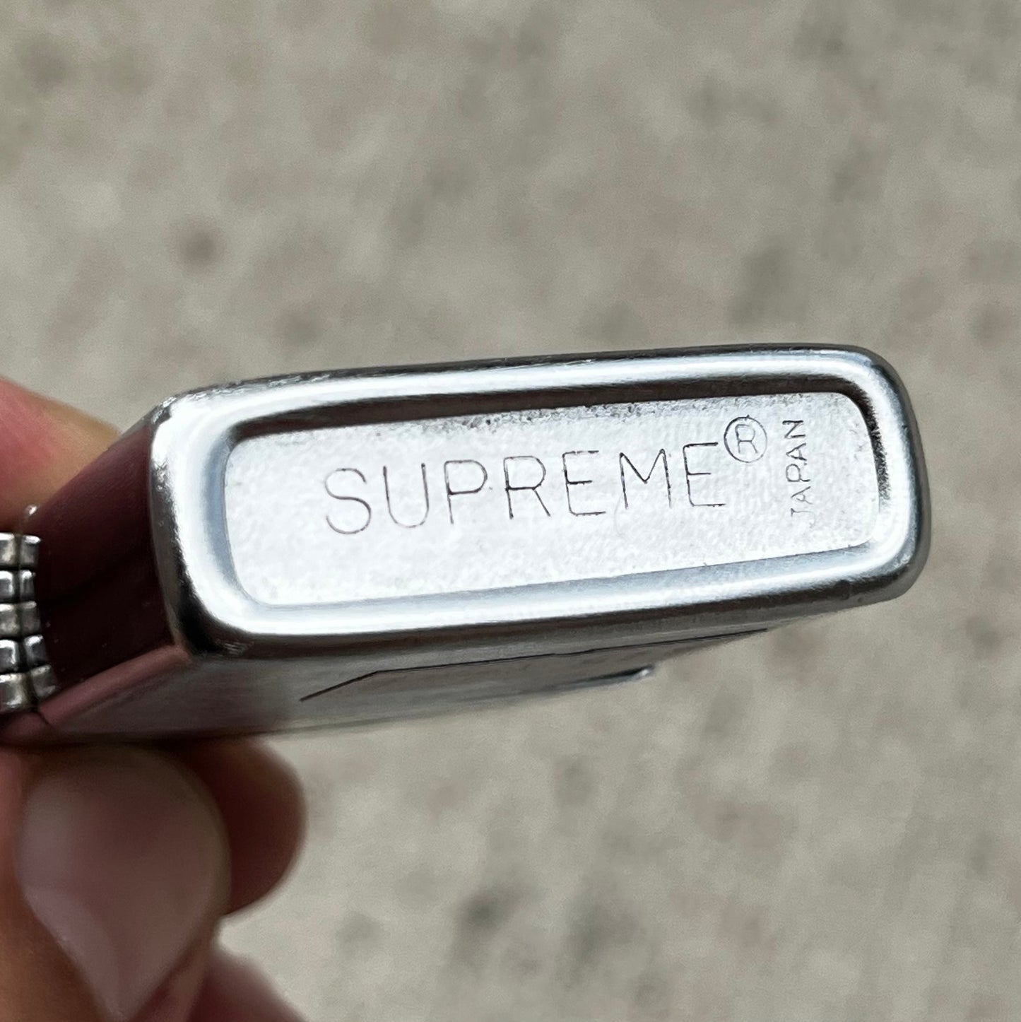 Vintage Supreme flip lighter.
