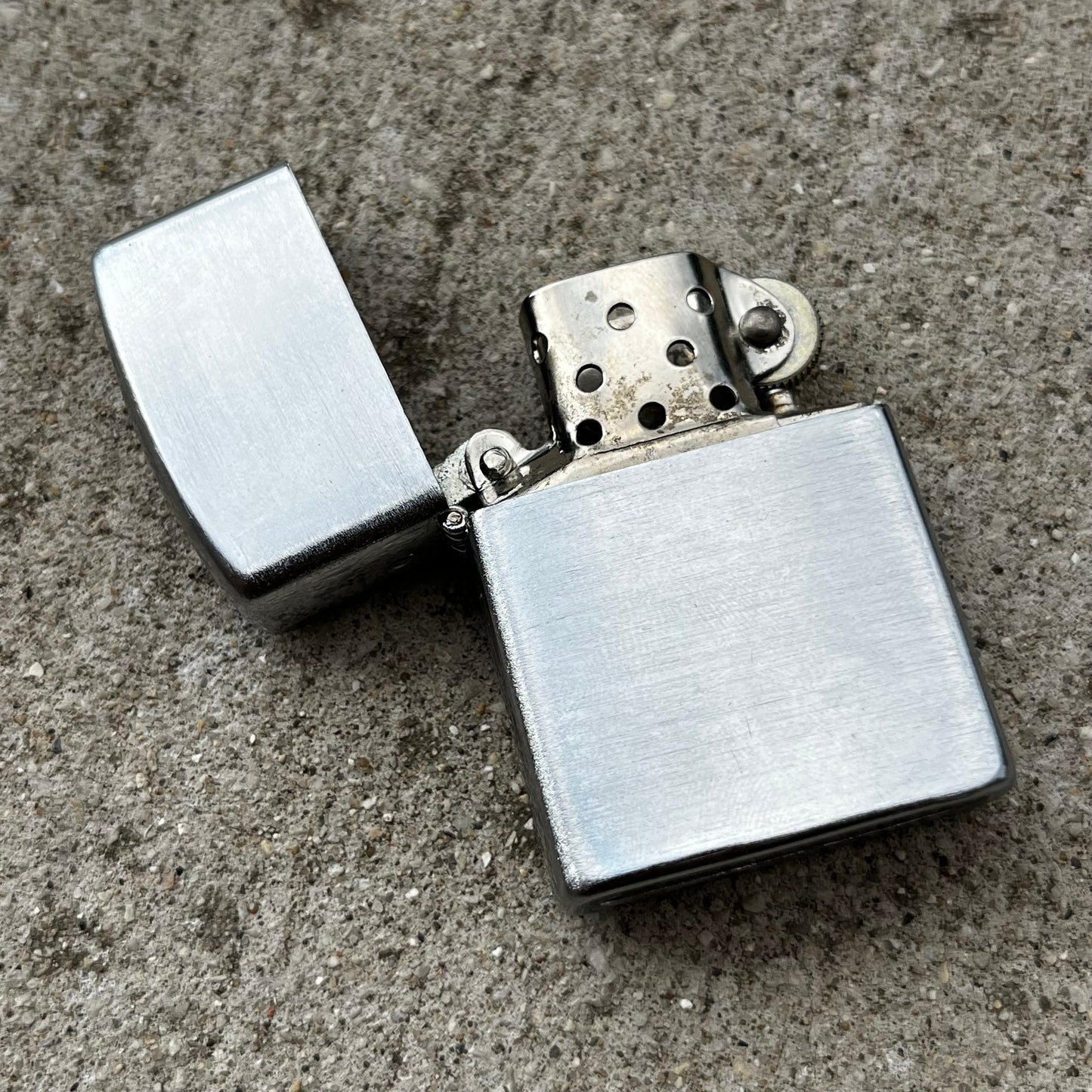Vintage Temple flip lighter.