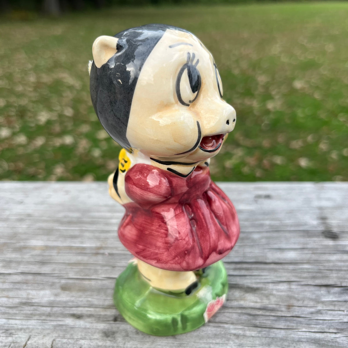 Vintage ceramic Petunia pig decanter.
