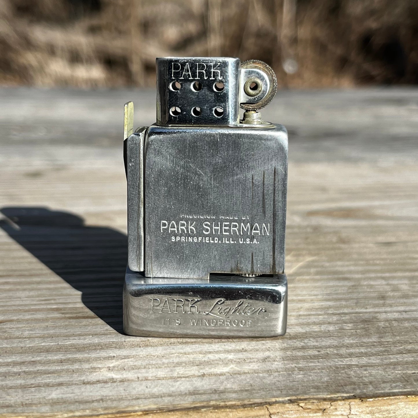 Vintage Park Sherman flip lighter.