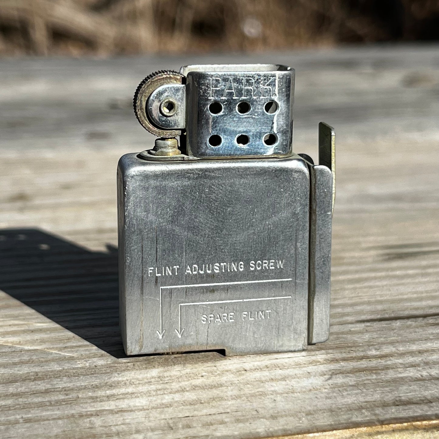 Vintage Park Sherman flip lighter.