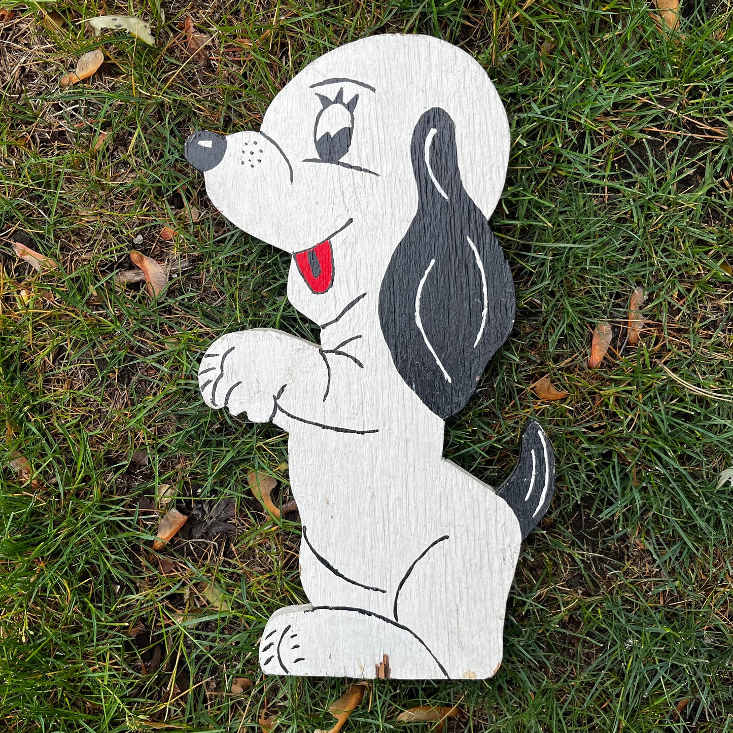 Vintage pup windmill holder.