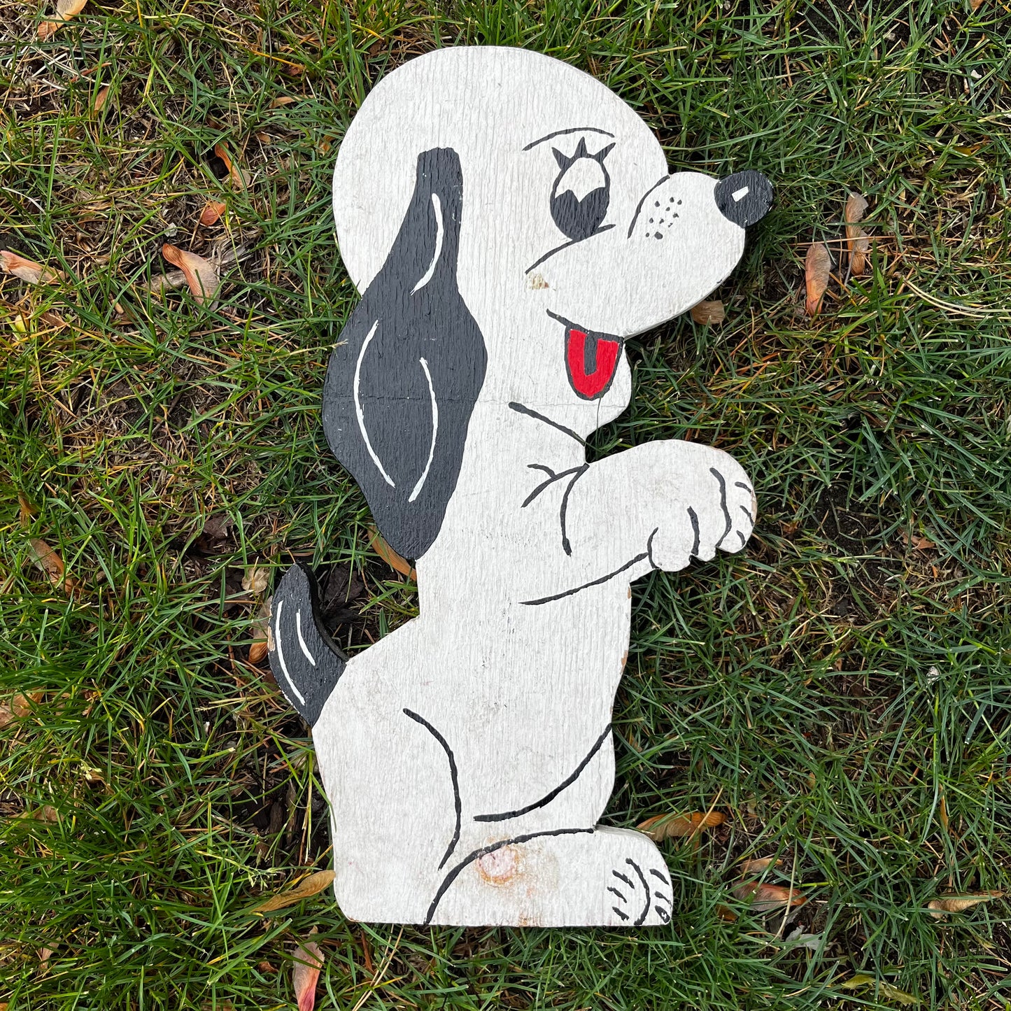 Vintage pup windmill holder.