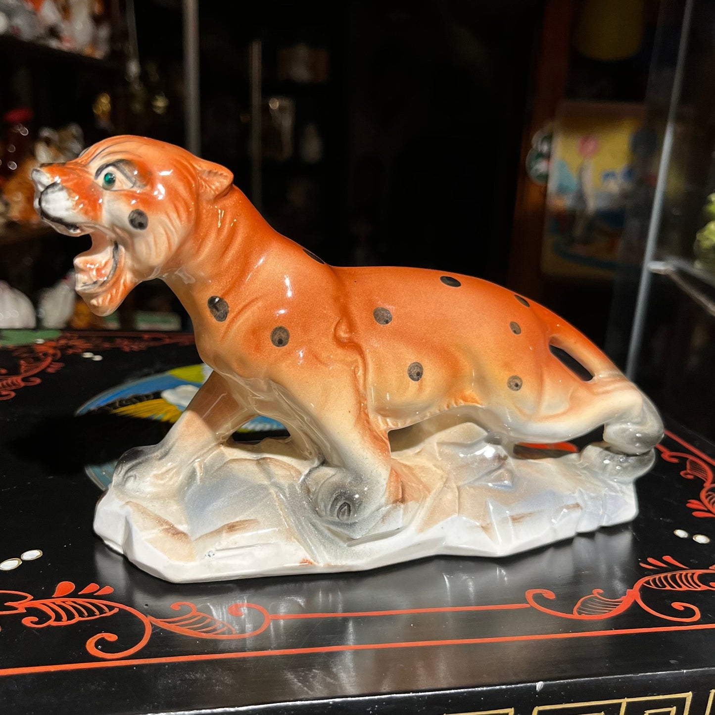Vintage ceramic green eyed leopard.