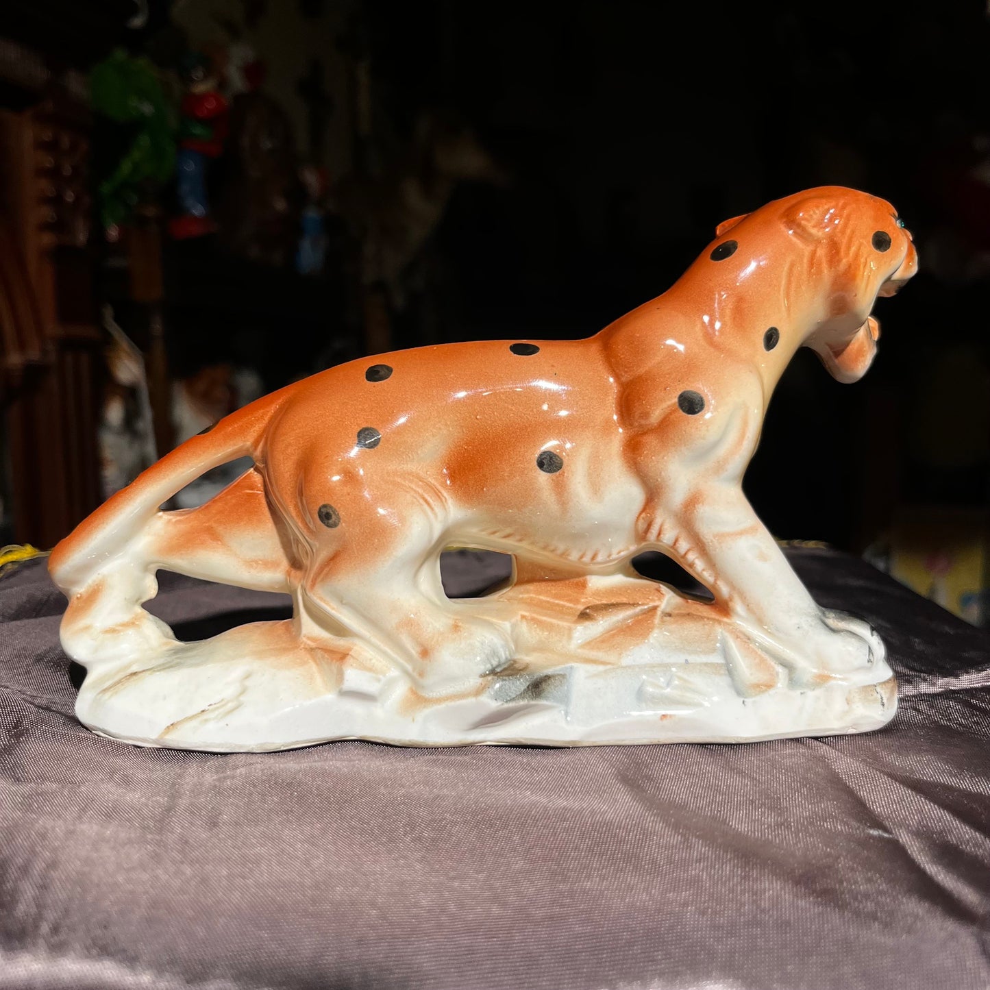 Vintage ceramic green eyed leopard.