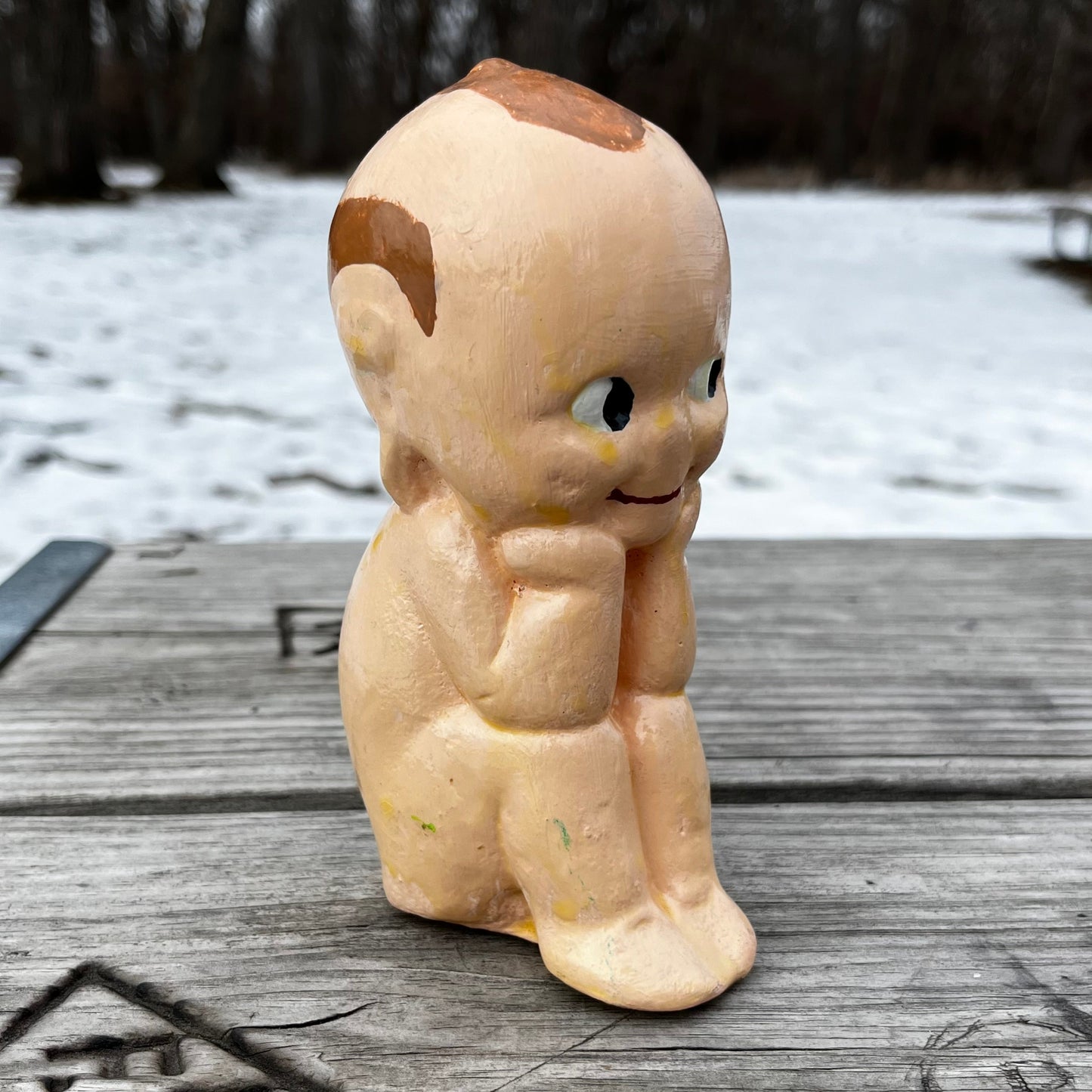 1950s Chalkware sitting kewpie.