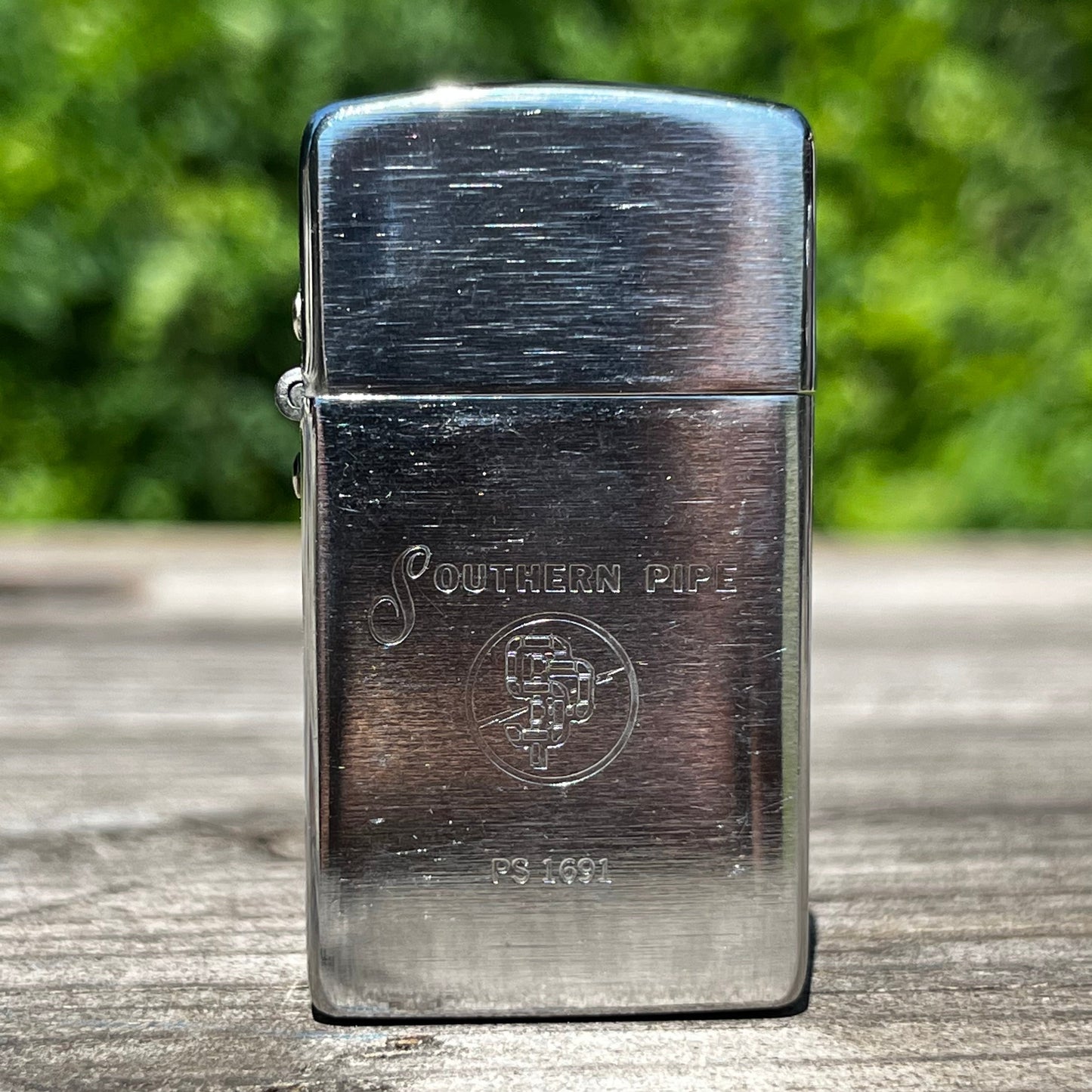Vintage Southern Pipe flip lighter.