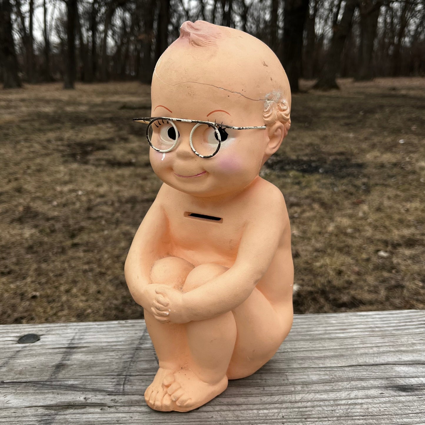 Vintage chalkware Kewpie coin bank. (Repaired)