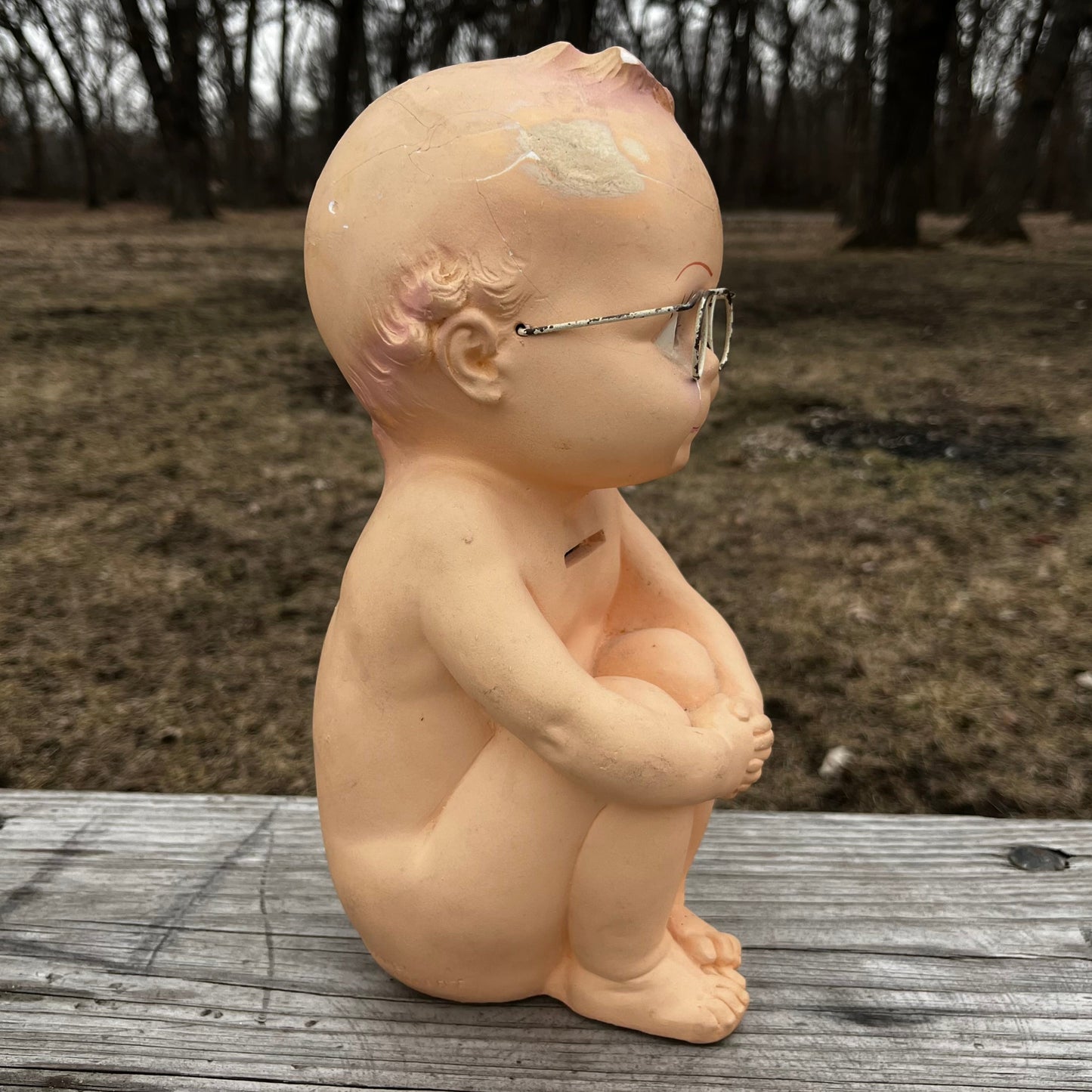 Vintage chalkware Kewpie coin bank. (Repaired)