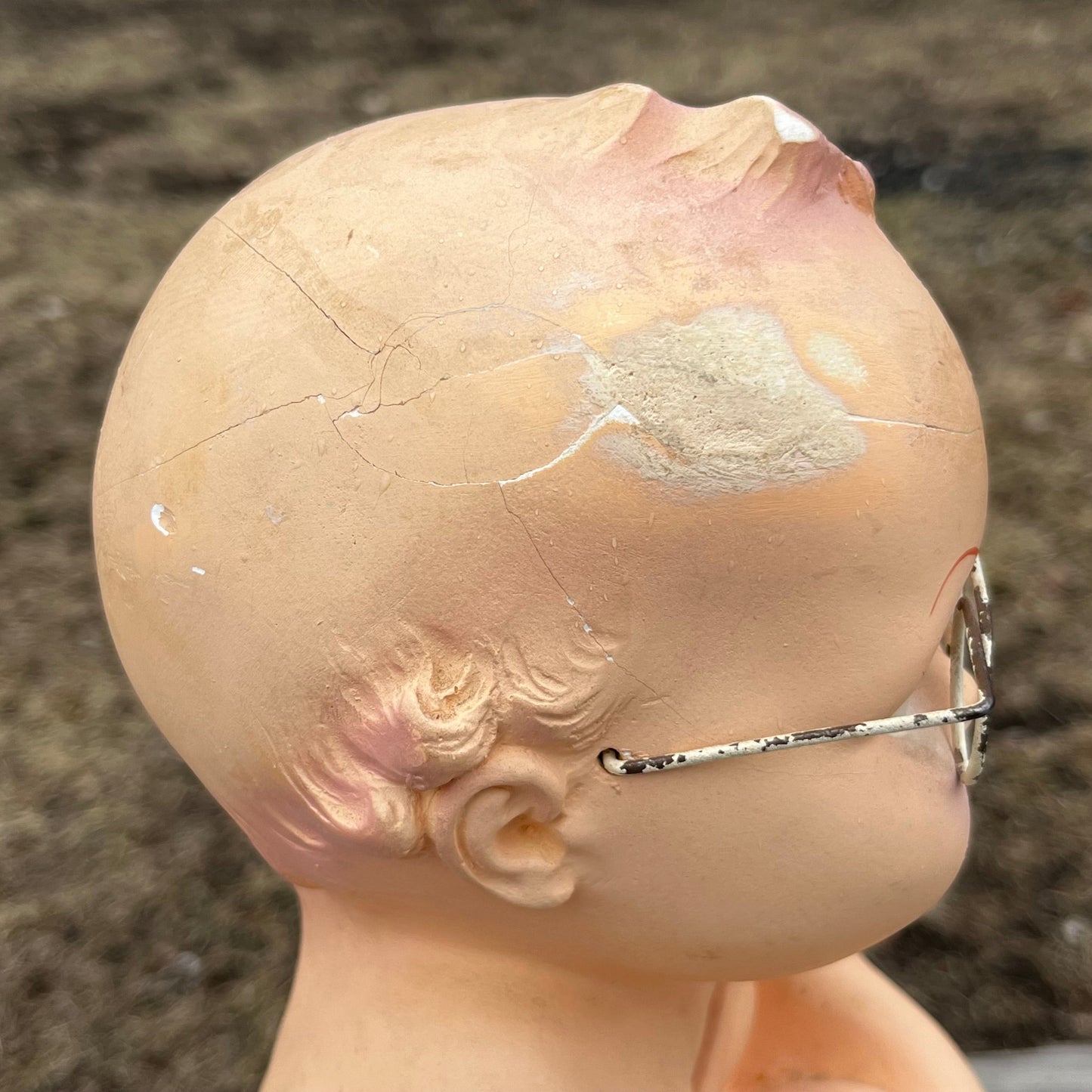 Vintage chalkware Kewpie coin bank. (Repaired)