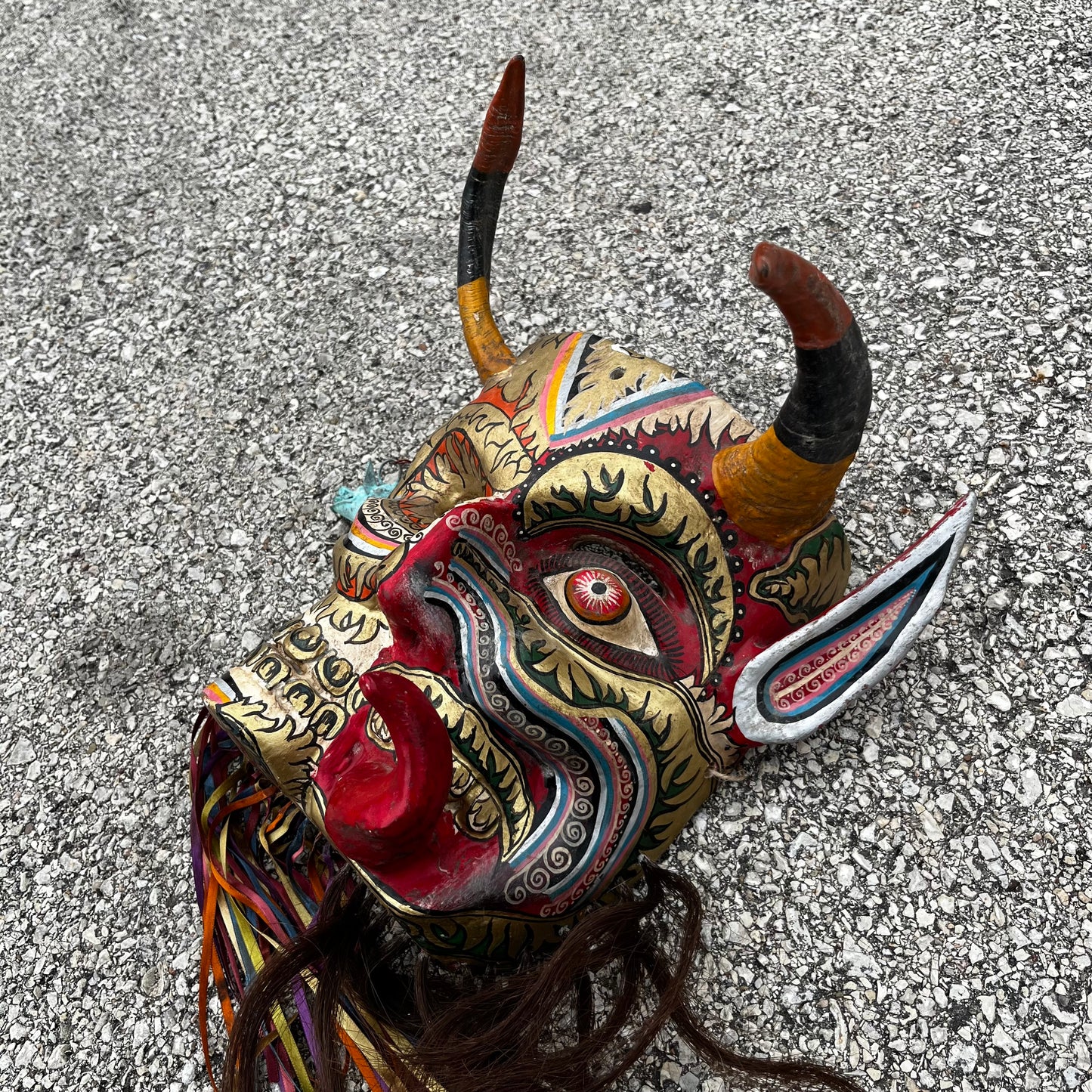 Split personality day of the dead Diablo mask.