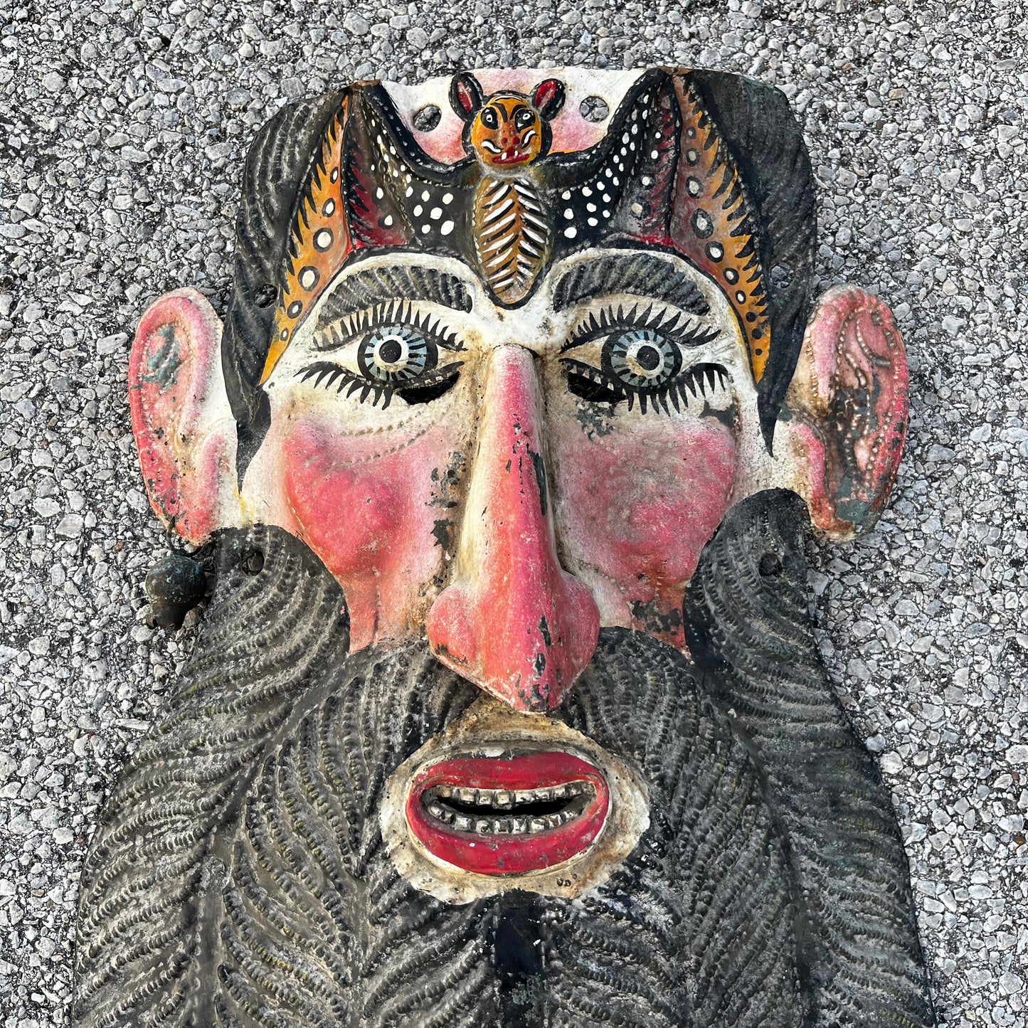 Early 1950s metal ceremonial Bat Barbones (bearded old man) mask.