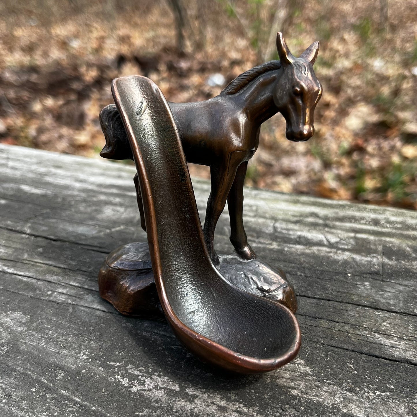 Vintage bronze horse pipe holder.