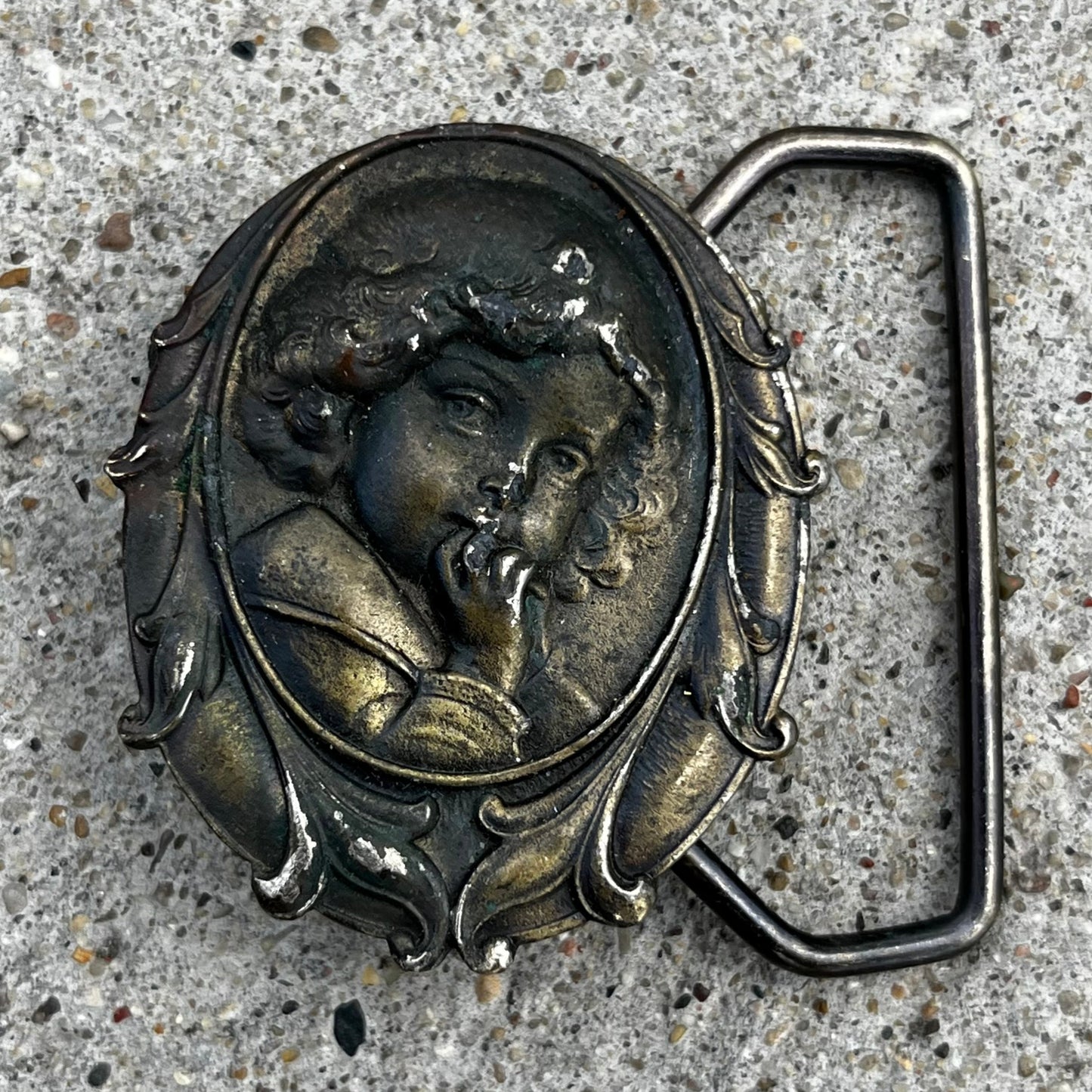 1975 Ornate belt buckle.
