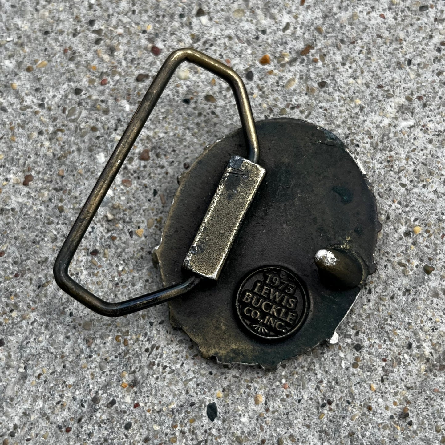 1975 Ornate belt buckle.