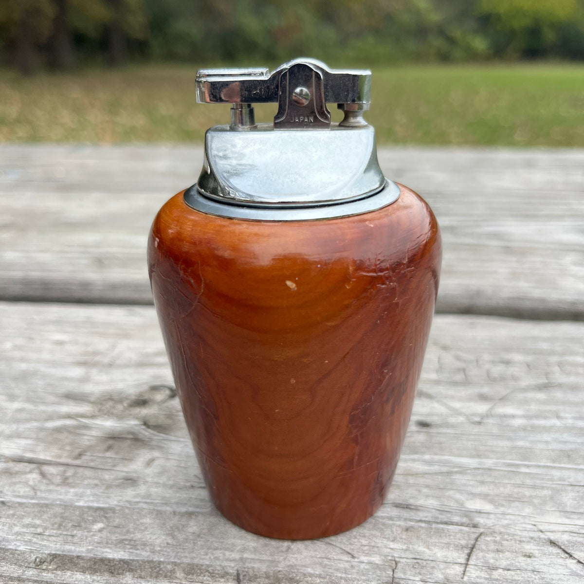 Vintage wooden tabletop lighter.