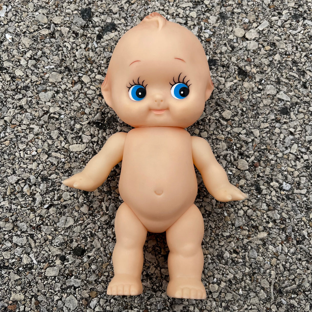 Vintage vinyl Kewpie.