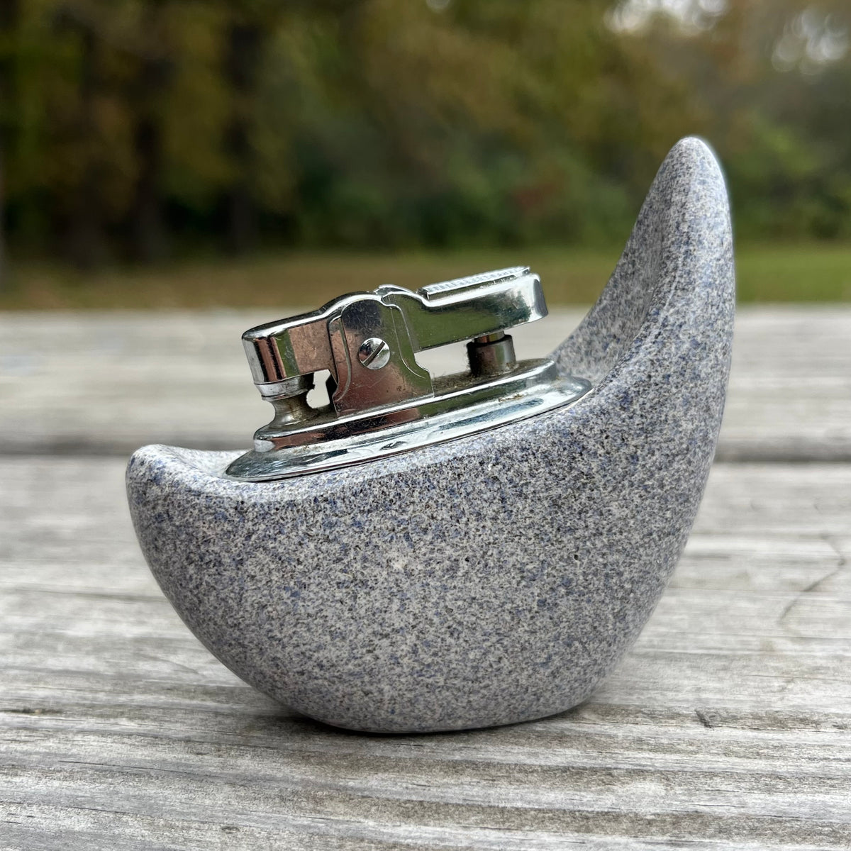 Vintage ceramic tabletop lighter.