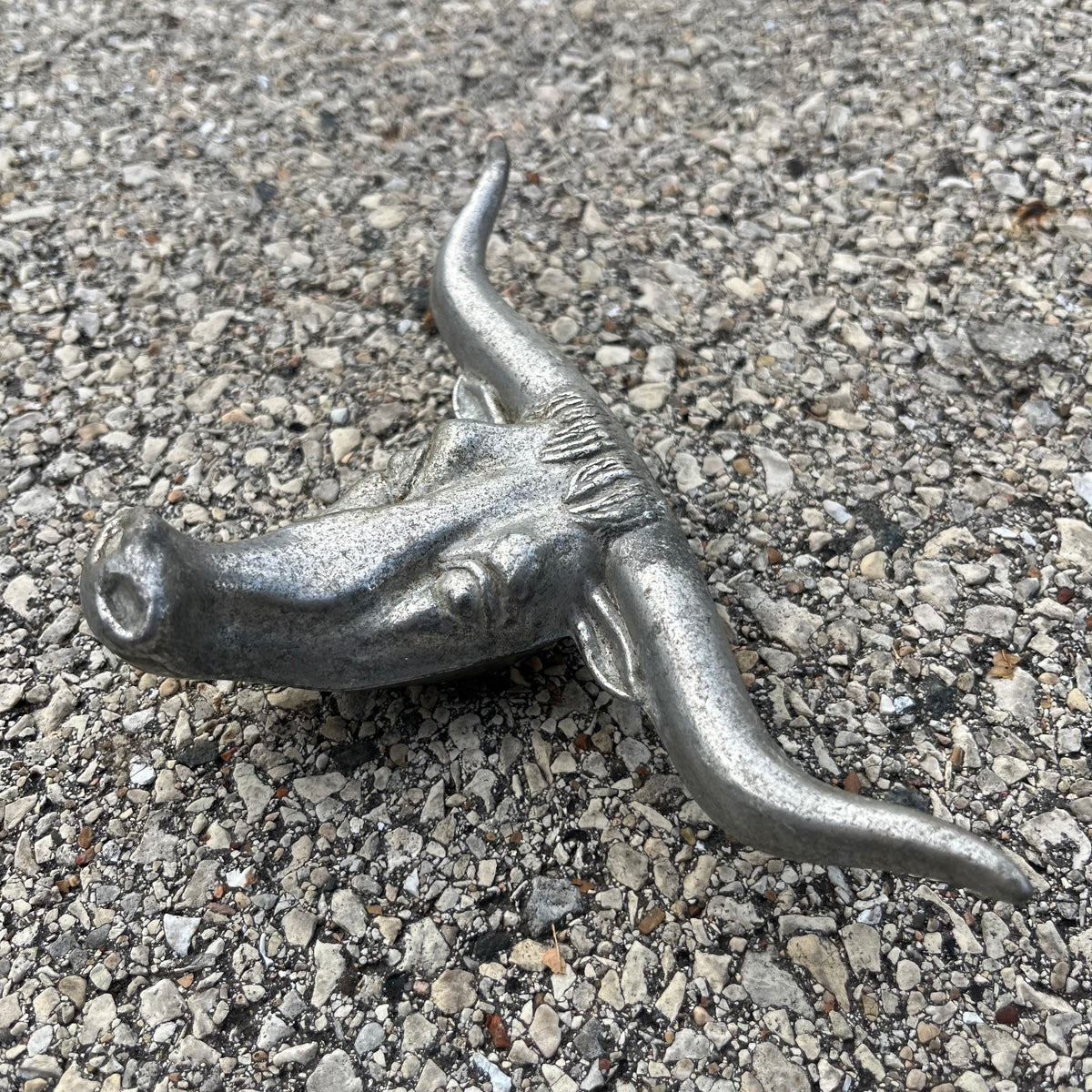 Vintage pewter longhorn hood ornament.