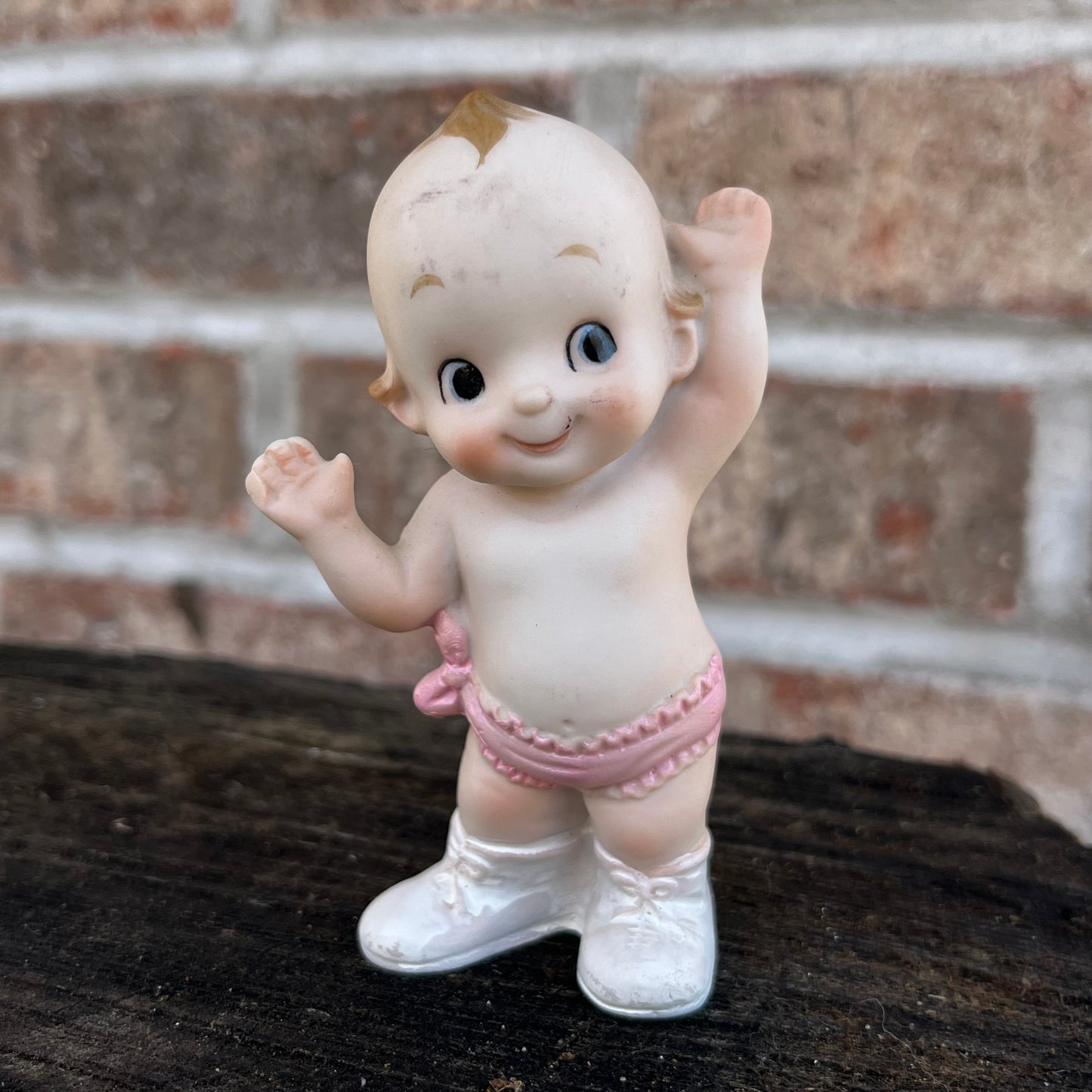 Vintage pink bow Kewpie.