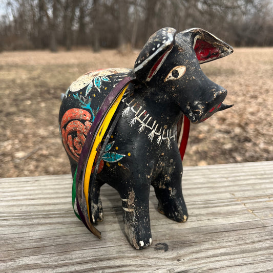 Hand crafted boar gourd maraca.