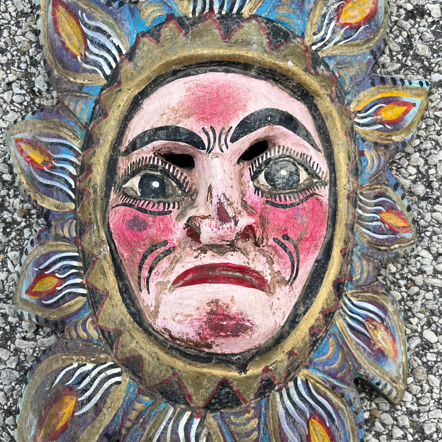 Vintage hand crafted sun mask.