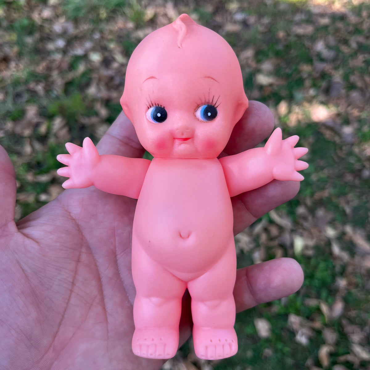 Vintage vinyl Kewpie.