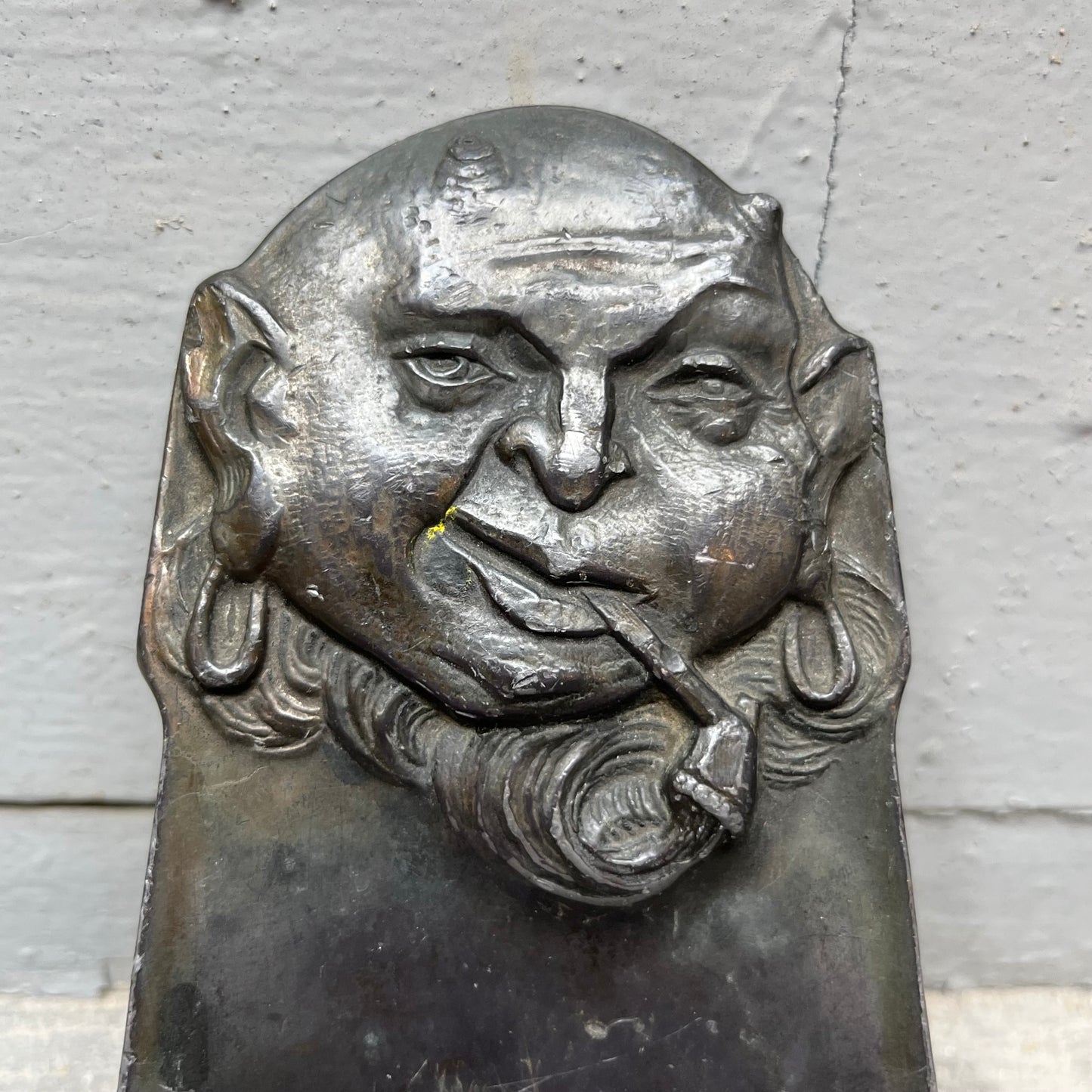Vintage pewter pipe smoking devil dish.