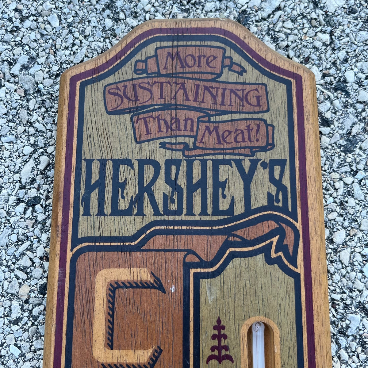 Vintage wooden Hershey’s chocolate thermometer.