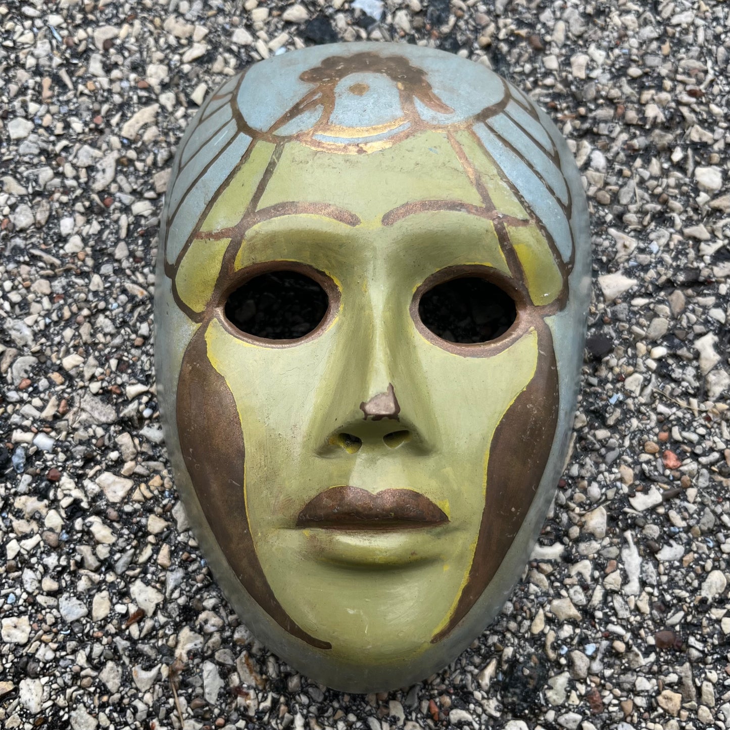 Vintage brass bird mask.